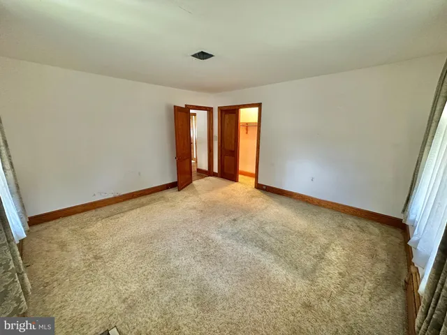 an empty room with windows