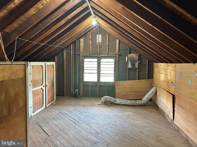 a view of outdoor space and wooden floor