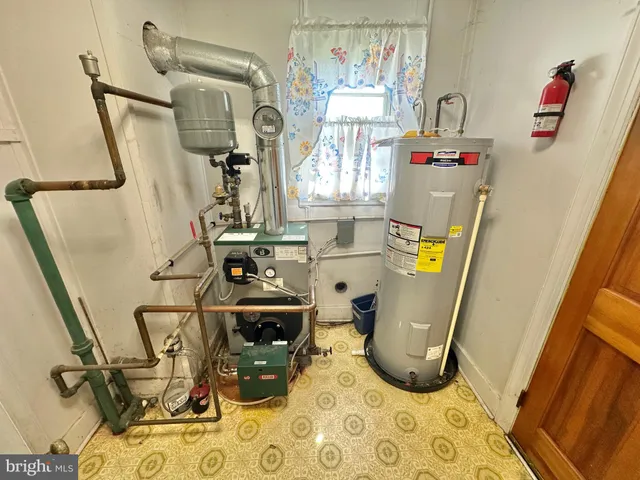 a view of living room with furniture and windows