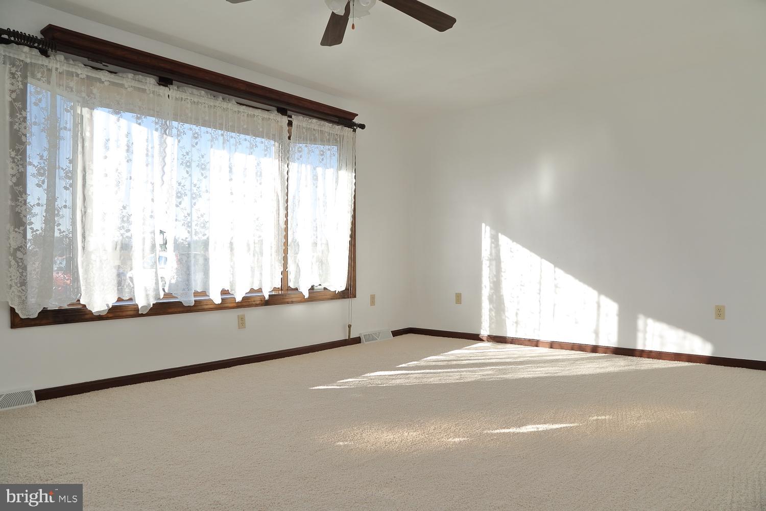 1007 East Meadow Road Manheim, PA 17545 - Photo 11 of 28 a view of an empty room with a window
