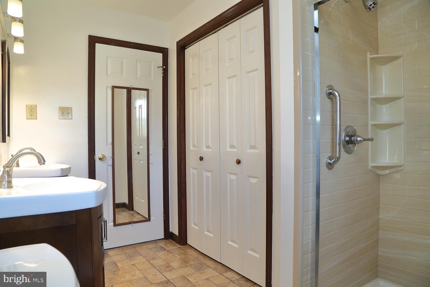1007 East Meadow Road Manheim, PA 17545 - Photo 16 of 28 a bathroom with a sink and a mirror
