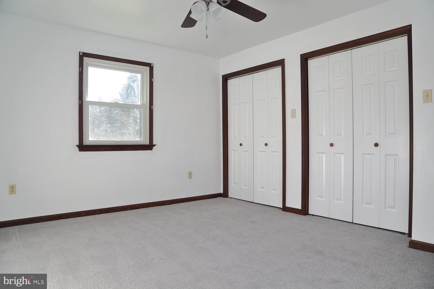 1007 East Meadow Road Manheim, PA 17545 - Photo 19 of 28 an empty room with windows and closet