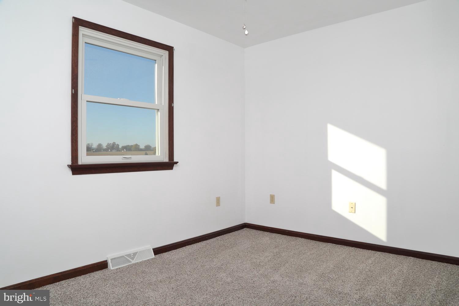 1007 East Meadow Road Manheim, PA 17545 - Photo 21 of 28 an empty room with a window