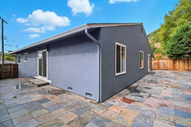 a front view of a house with windows