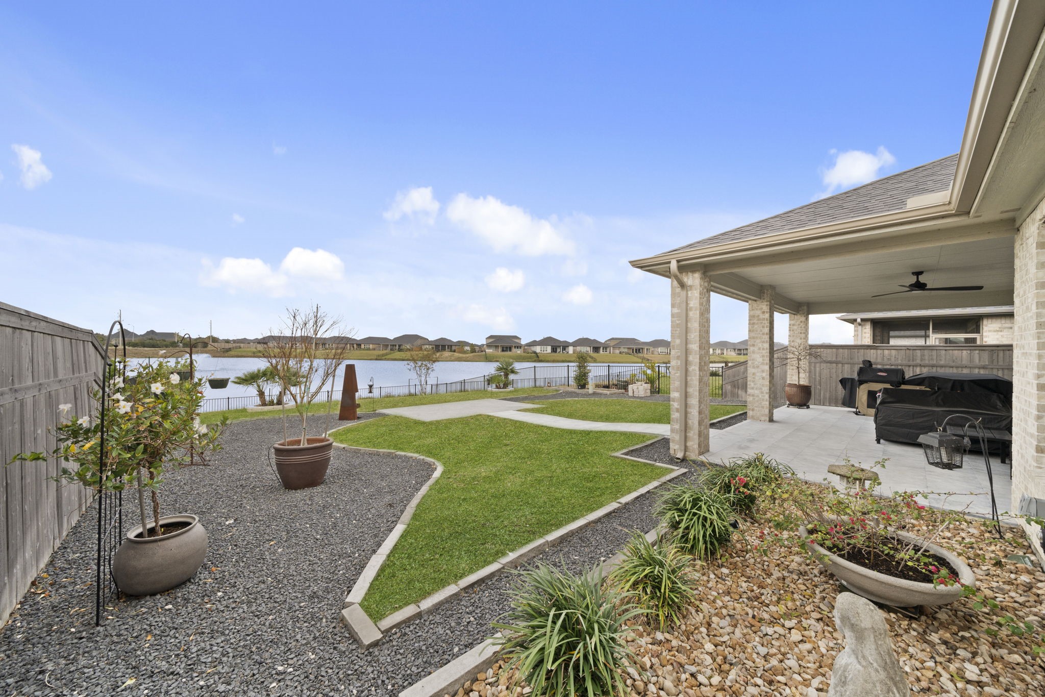 29154 Rustic Orch Lane Fulshear, TX 77441 - Photo 1 of 35 a view of a backyard with sitting area