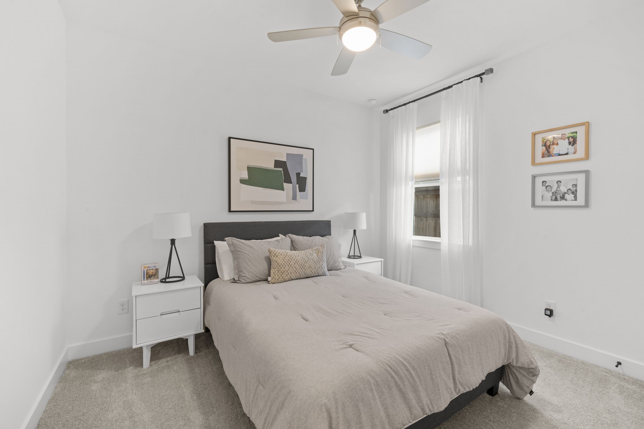 29154 Rustic Orch Lane Fulshear, TX 77441 - Photo 11 of 35 a bedroom with a bed and a window