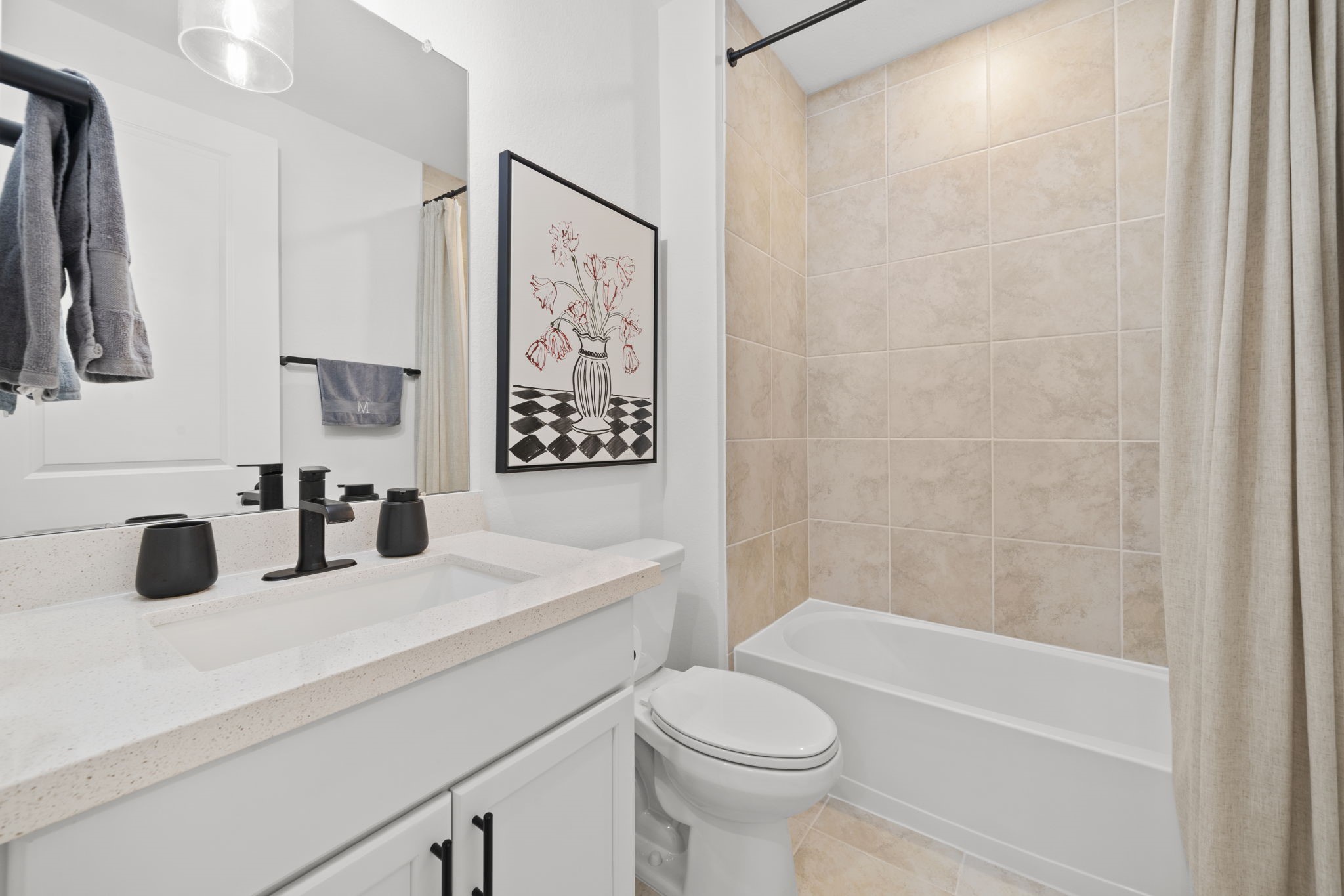 29154 Rustic Orch Lane Fulshear, TX 77441 - Photo 12 of 35 a bathroom with a sink a toilet and shower