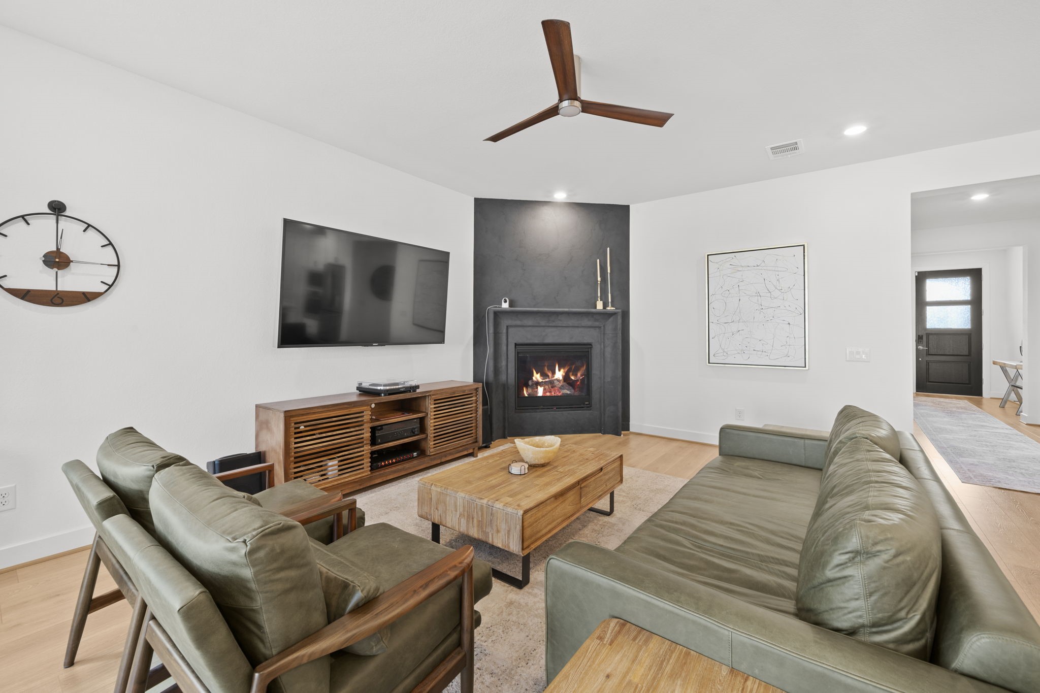 29154 Rustic Orch Lane Fulshear, TX 77441 - Photo 20 of 35 a living room with furniture and a flat screen tv