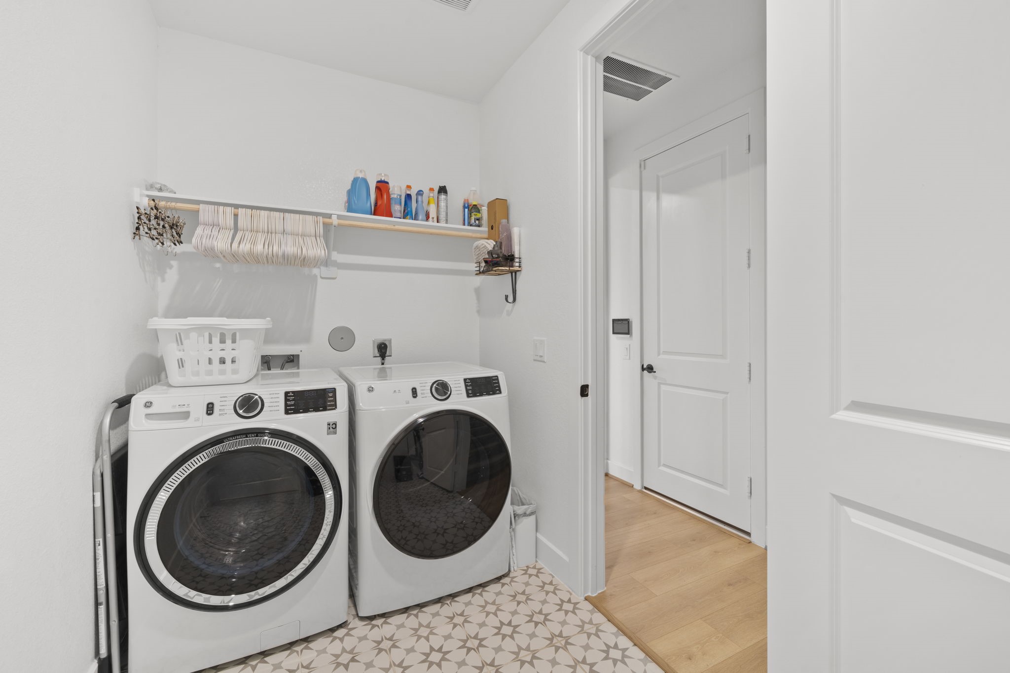29154 Rustic Orch Lane Fulshear, TX 77441 - Photo 23 of 35 a utility room with dryer and washer