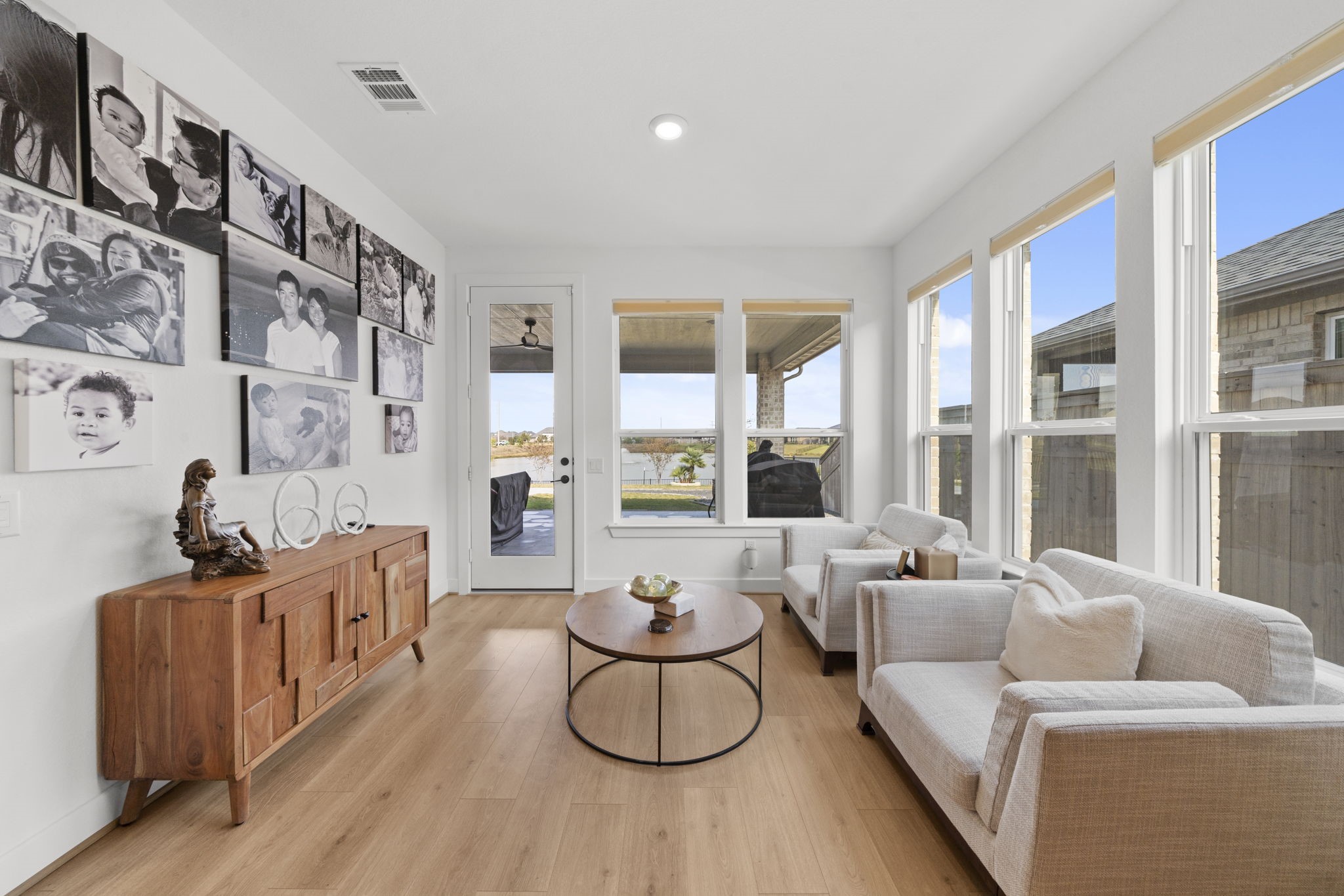 29154 Rustic Orch Lane Fulshear, TX 77441 - Photo 7 of 35 a living room with furniture and a large window