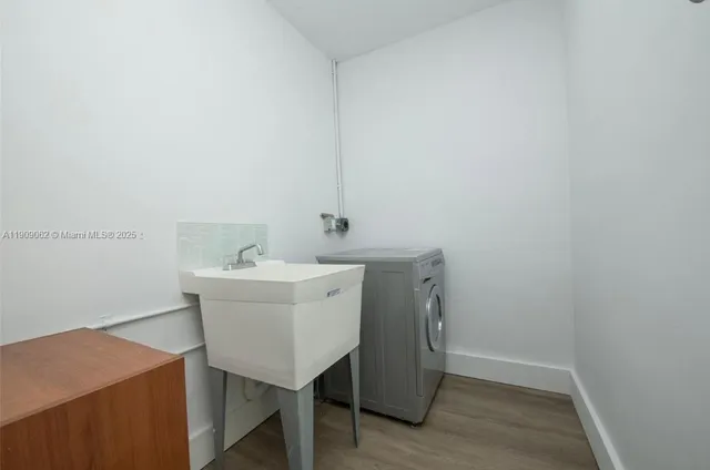 a utility room with a sink
