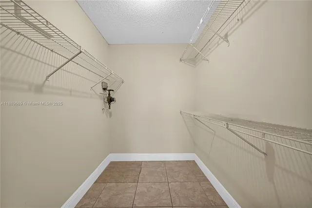 a view of a room with racks on the wall