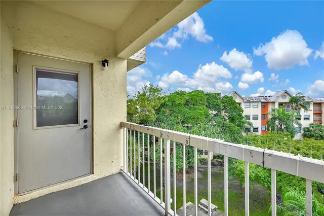 a view of a balcony with an outdoor space