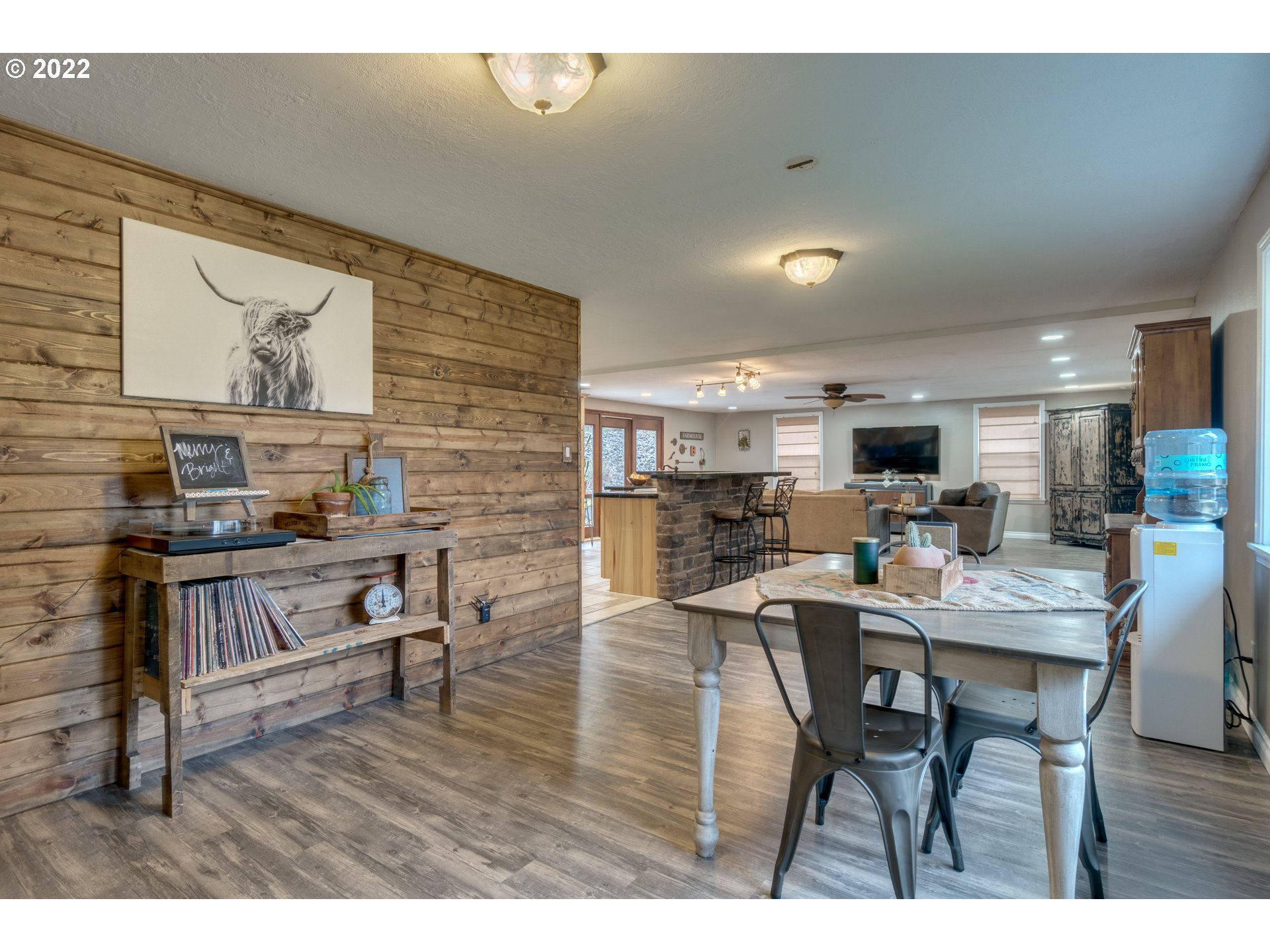 623 Ragland Road Longview, WA 98632 - Photo 18 of 30 a workspace with furniture and wooden floor