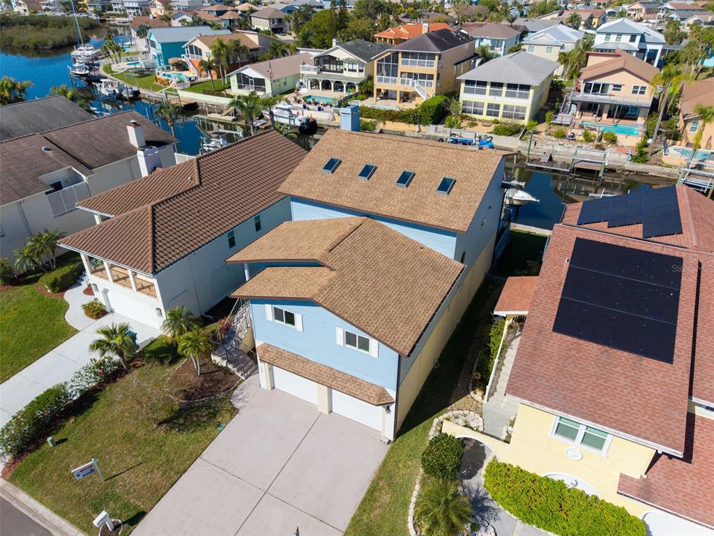 6241 Bayside Drive New Port Richey, FL 34652 - Photo 4 of 78 an aerial view of a houses with yard