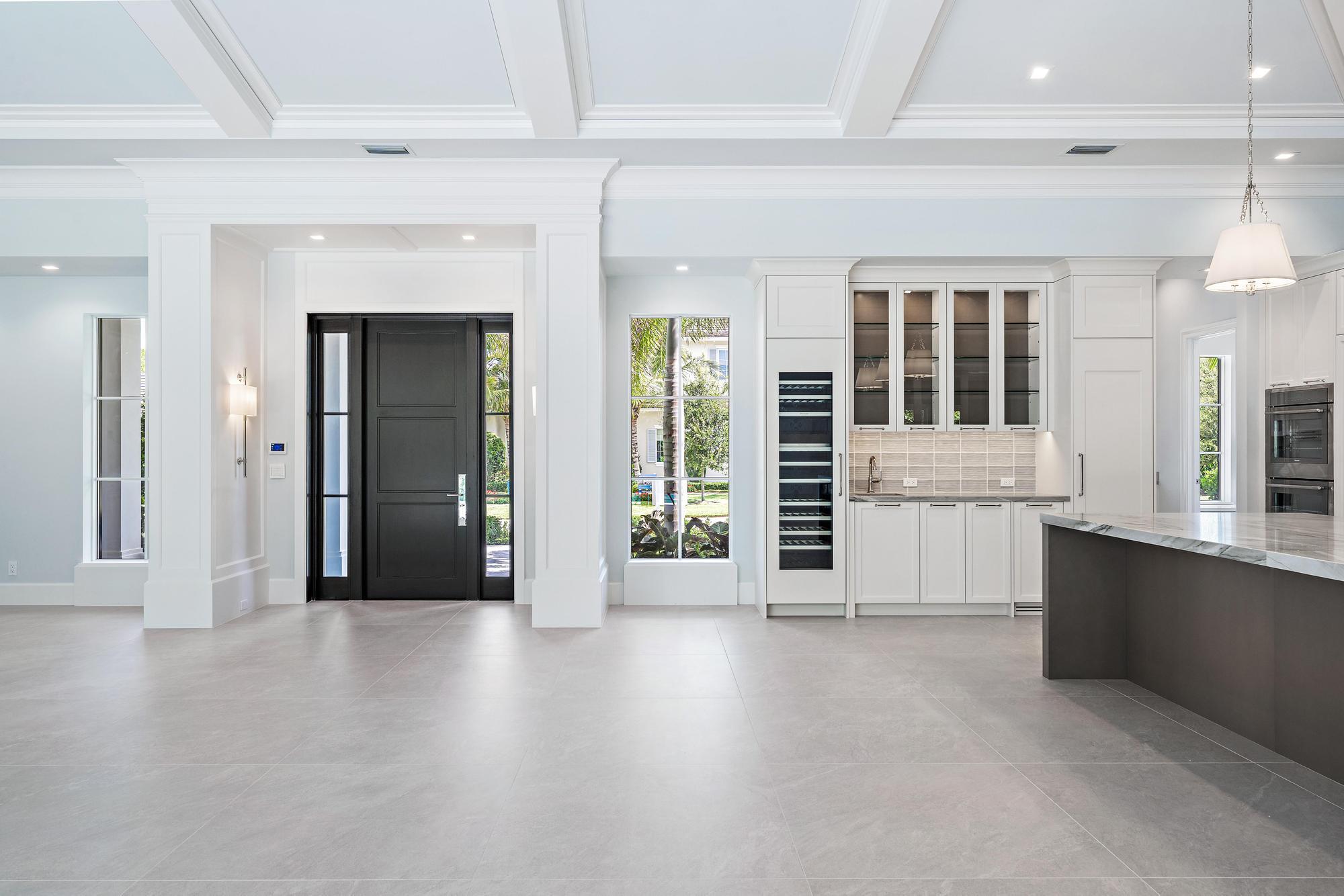 2914 Bluewater Cove Gulf Stream, FL 33483 - Photo 14 of 45 a view of a kitchen with a sink and cabinets