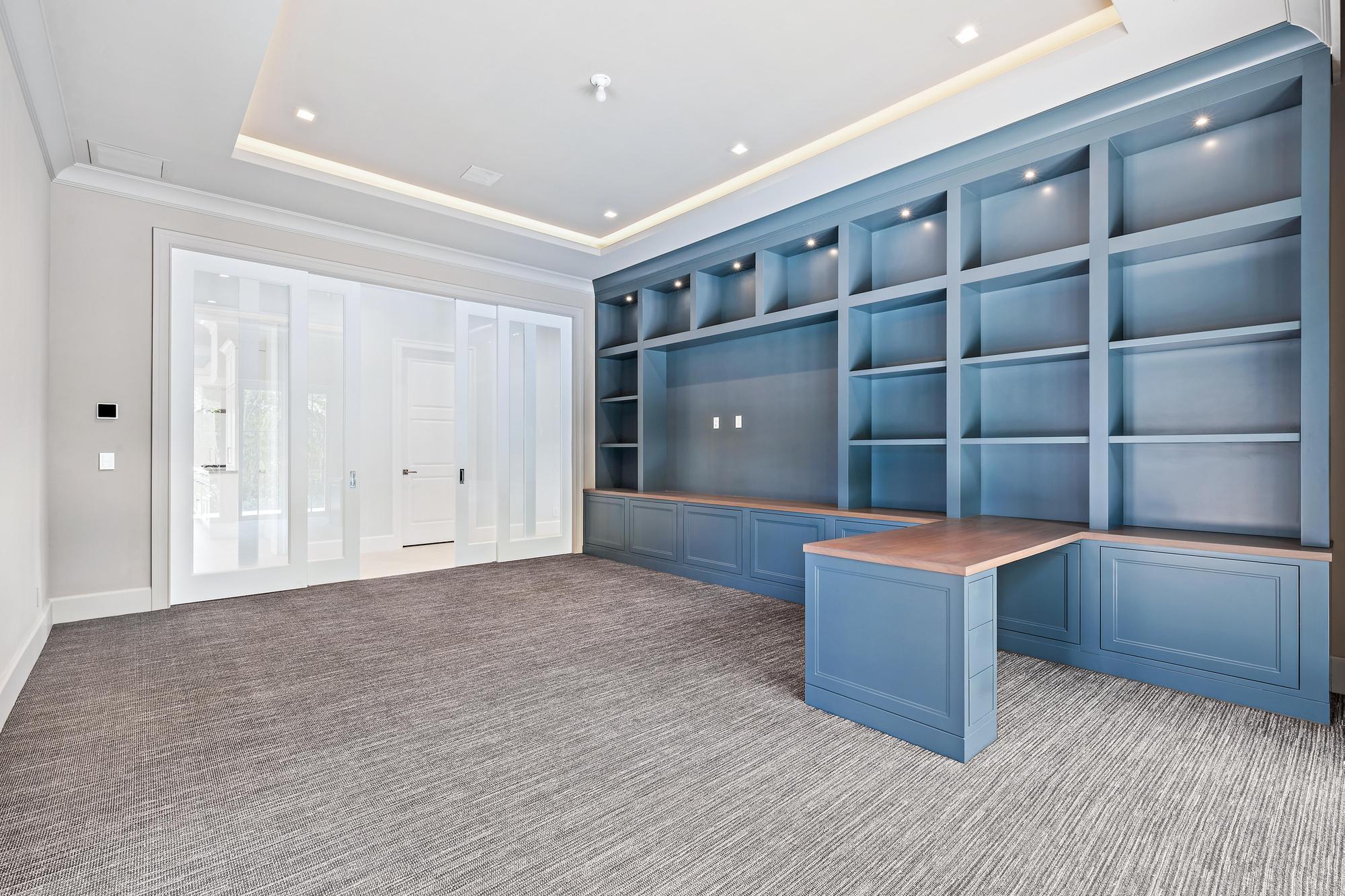 2914 Bluewater Cove Gulf Stream, FL 33483 - Photo 17 of 45 a view of kitchen with cabinets and wooden floor