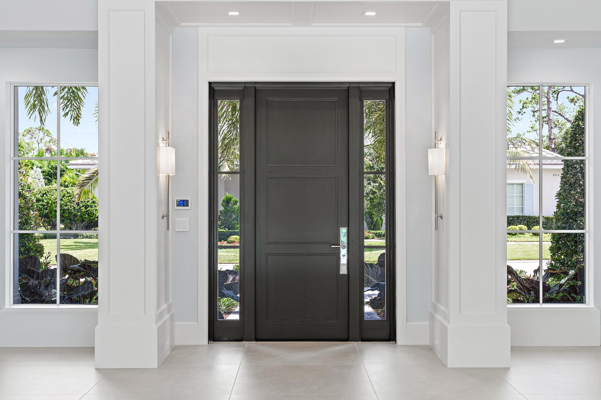 2914 Bluewater Cove Gulf Stream, FL 33483 - Photo 2 of 45 a view of an entryway of the house