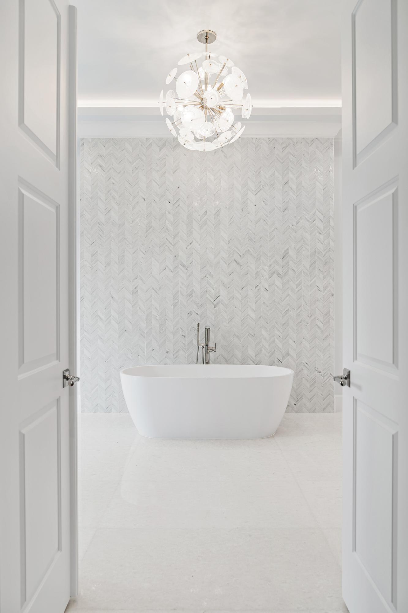 2914 Bluewater Cove Gulf Stream, FL 33483 - Photo 23 of 45 a bath tub sitting next to a white sink