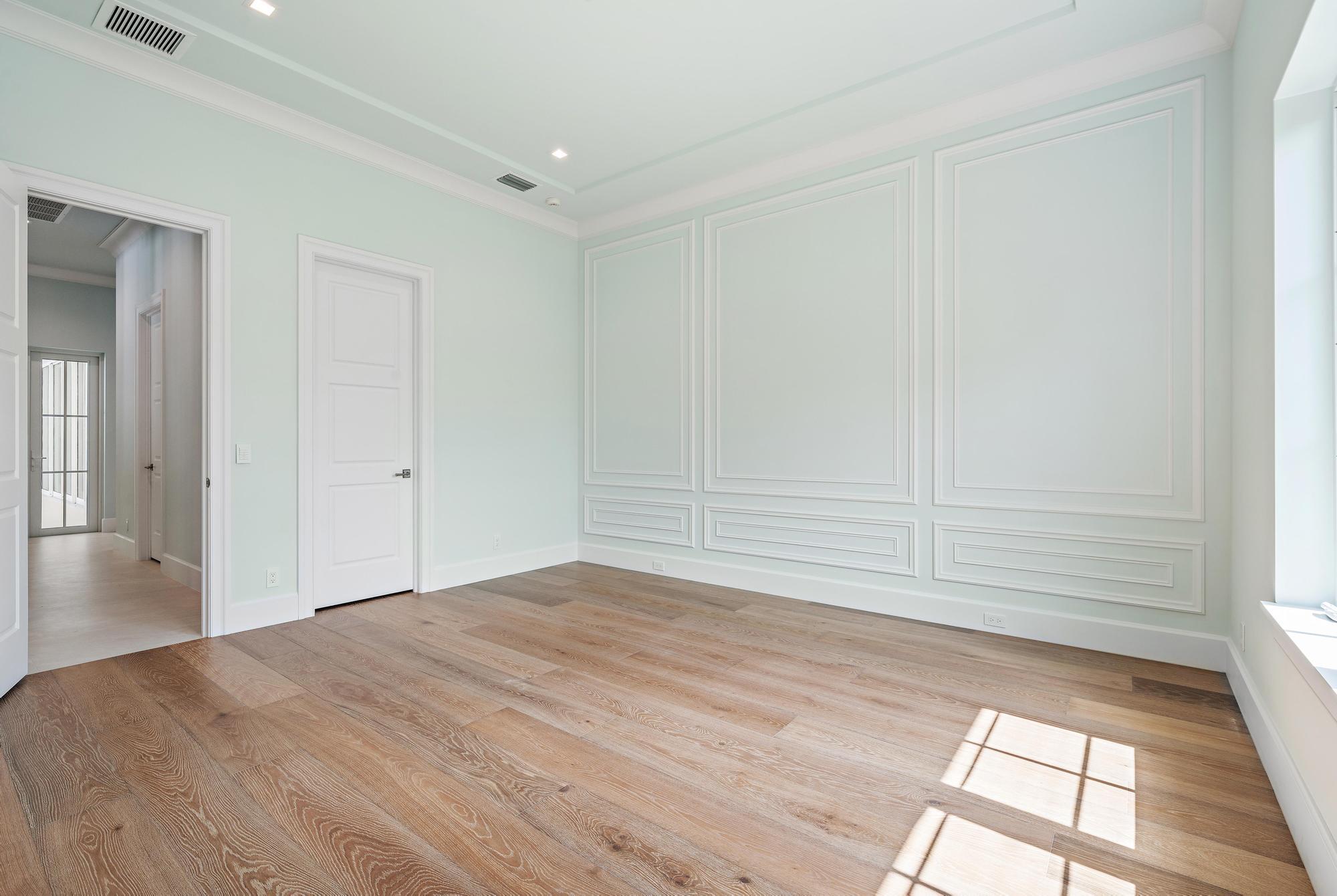 2914 Bluewater Cove Gulf Stream, FL 33483 - Photo 29 of 45 a view of empty room with wooden floor