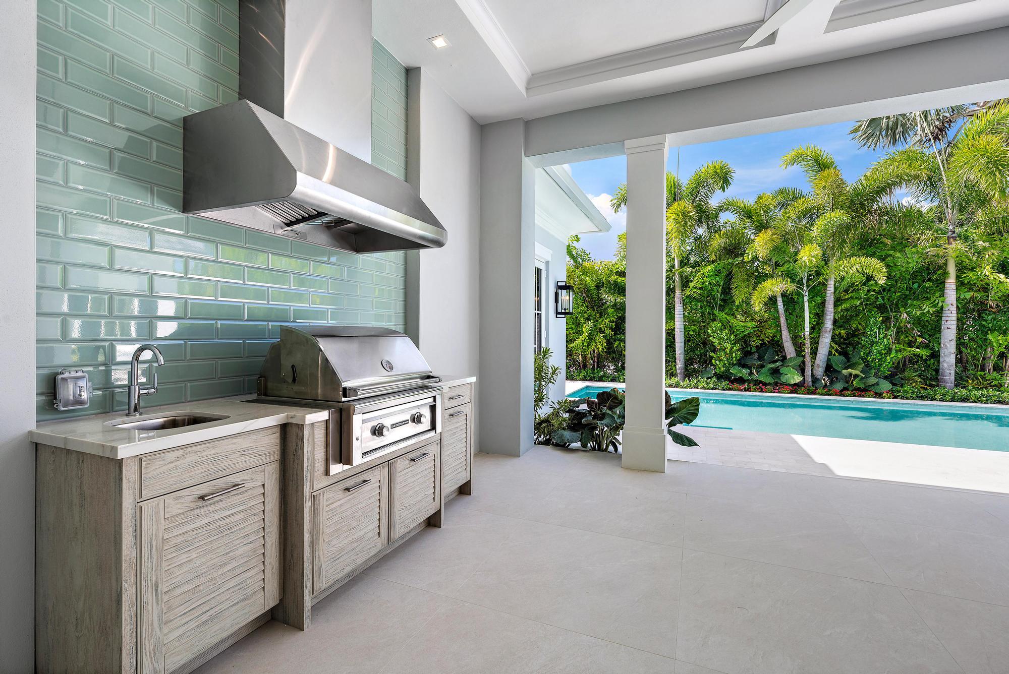 2914 Bluewater Cove Gulf Stream, FL 33483 - Photo 37 of 45 a kitchen that has a lot of fruit on it