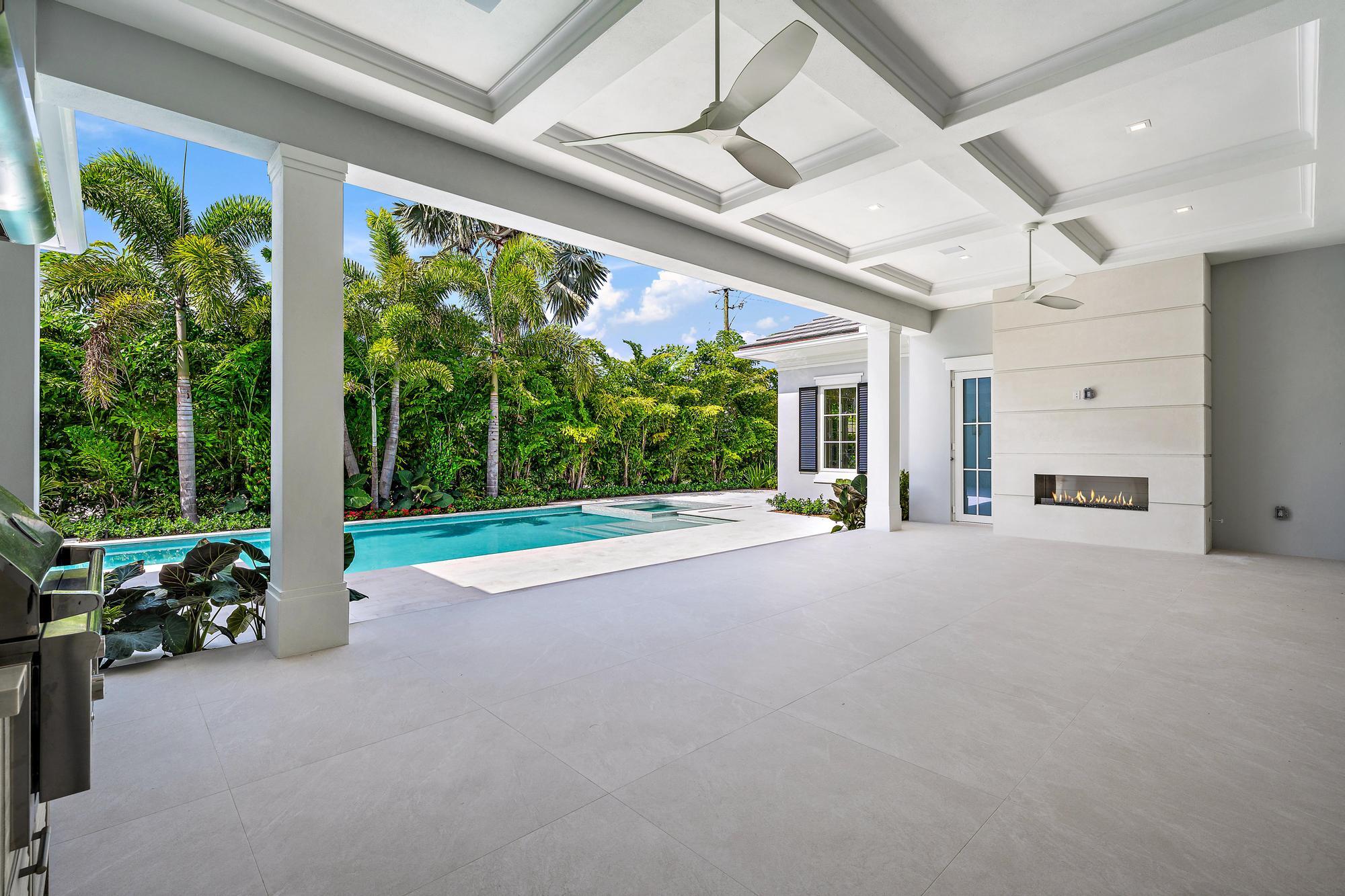 2914 Bluewater Cove Gulf Stream, FL 33483 - Photo 39 of 45 a view of a porch with garden