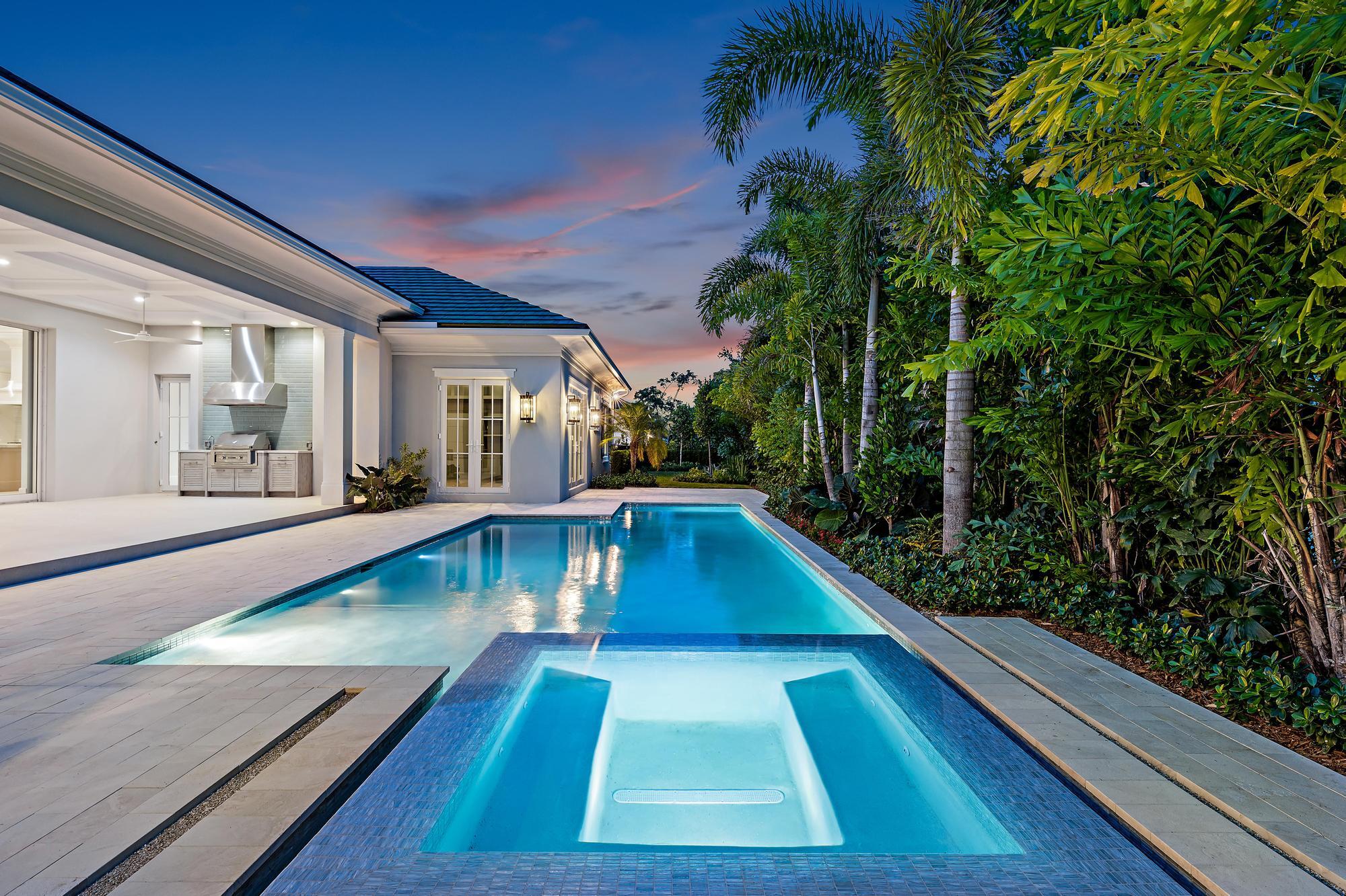 2914 Bluewater Cove Gulf Stream, FL 33483 - Photo 44 of 45 a view of swimming pool with chairs