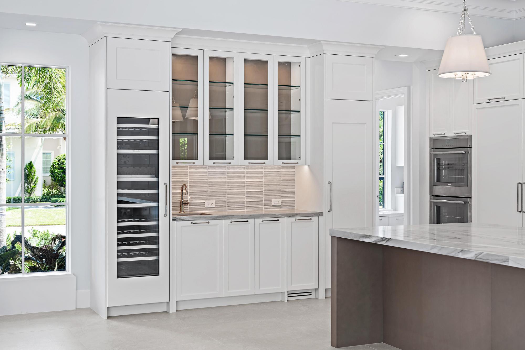 2914 Bluewater Cove Gulf Stream, FL 33483 - Photo 7 of 45 a view of kitchen with granite countertop cabinets and window