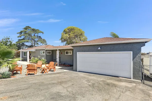 front view of a house with a patio