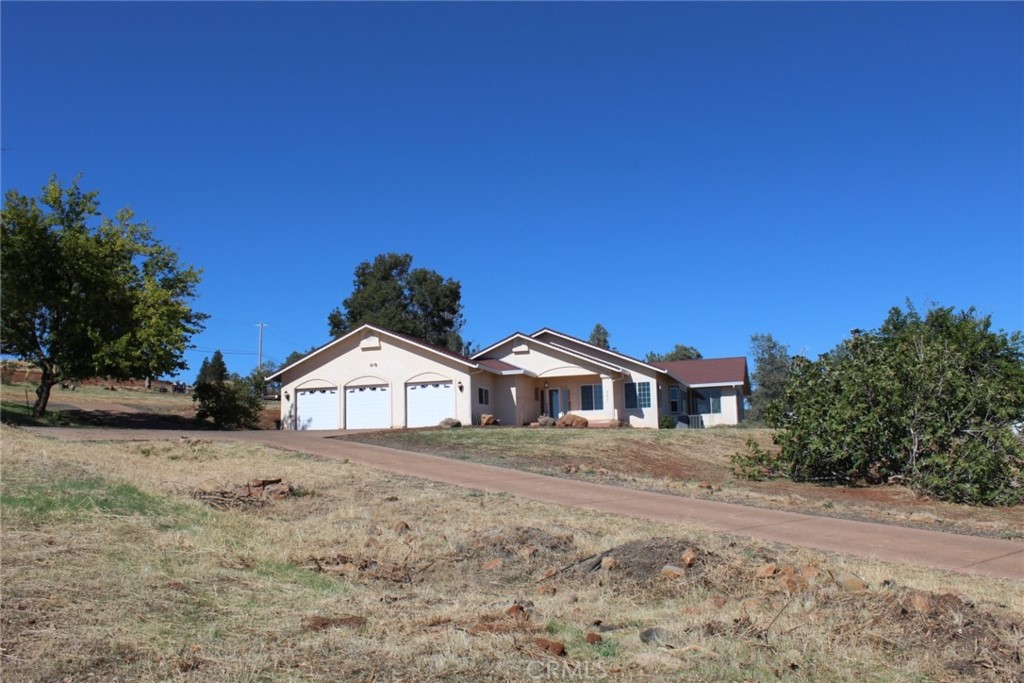 355 Wayland Road Paradise, CA 95969 - Photo 1 of 1 a house with a yard