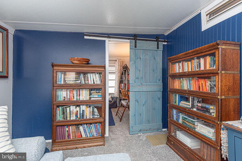 114 Skipjack Circle Berlin, MD 21811 - Photo 20 of 51 a view of a livingroom with shelves