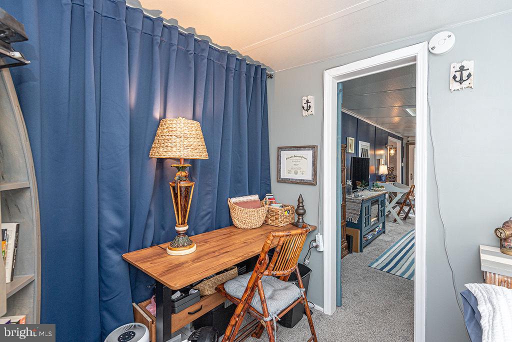 114 Skipjack Circle Berlin, MD 21811 - Photo 23 of 51 a dining room with a table and chairs