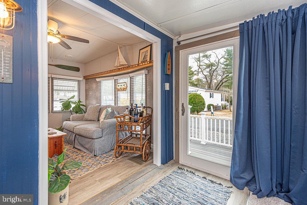114 Skipjack Circle Berlin, MD 21811 - Photo 24 of 51 a living room with furniture and a window
