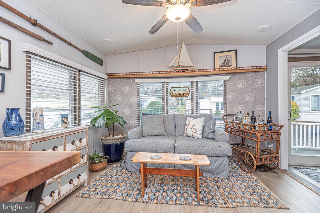 114 Skipjack Circle Berlin, MD 21811 - Photo 25 of 51 a living room with furniture and a large window