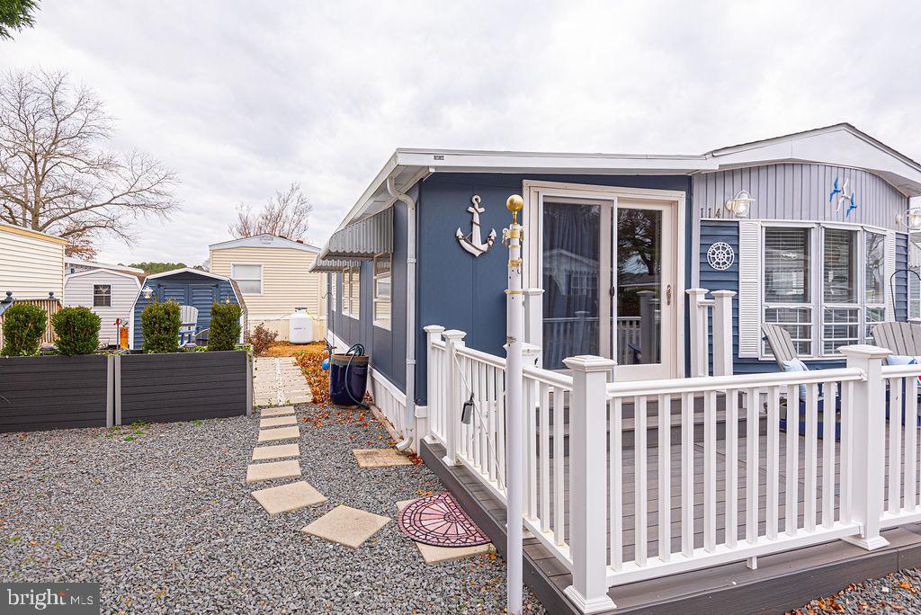 114 Skipjack Circle Berlin, MD 21811 - Photo 3 of 51 a view of a house with wooden fence