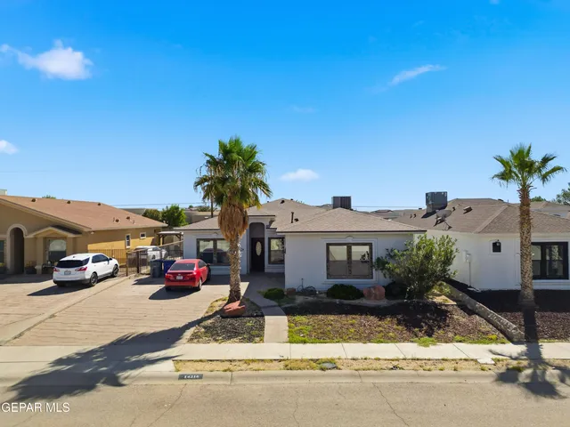 a car parked in front of a house