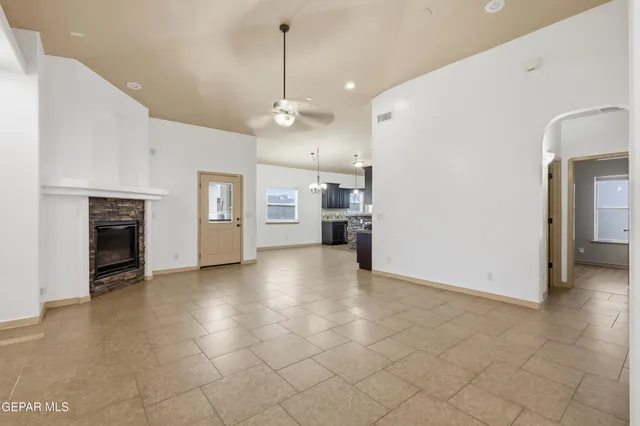 a view of a kitchen with a sink and a stove top oven