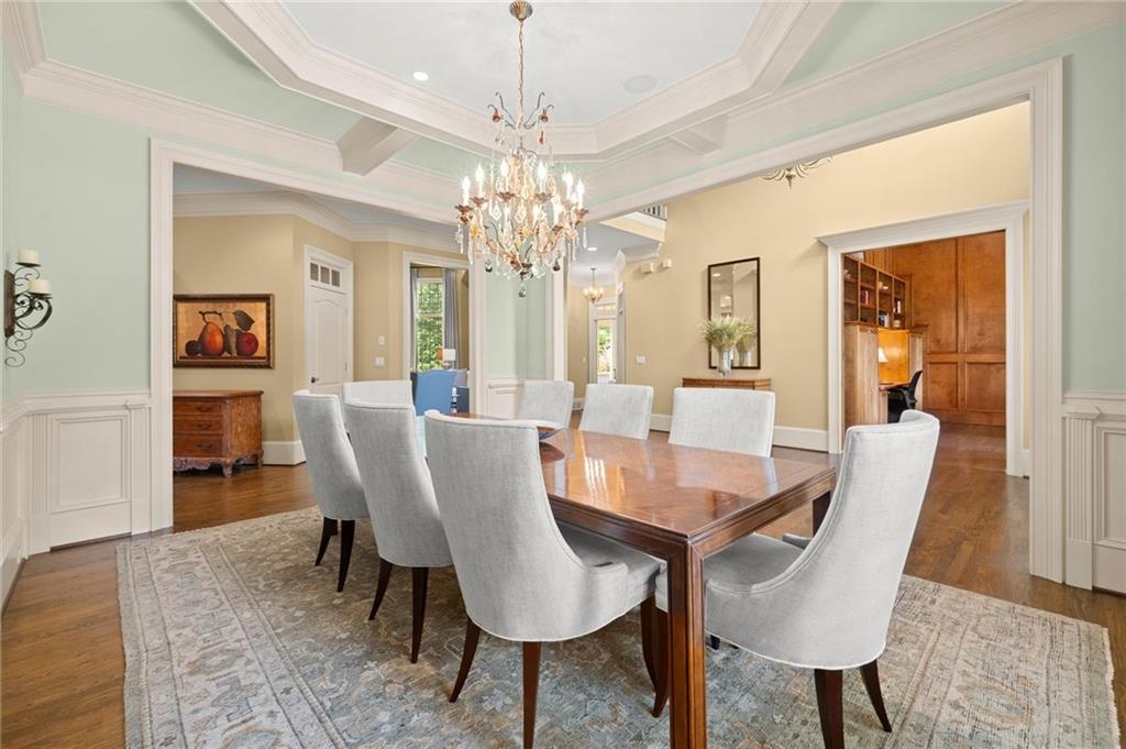 322 Edwards Brook Lane Canton, GA 30115 - Photo 16 of 99 a view of a dining room with furniture and a chandelier