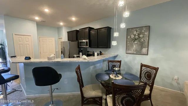 a view of backyard with green space