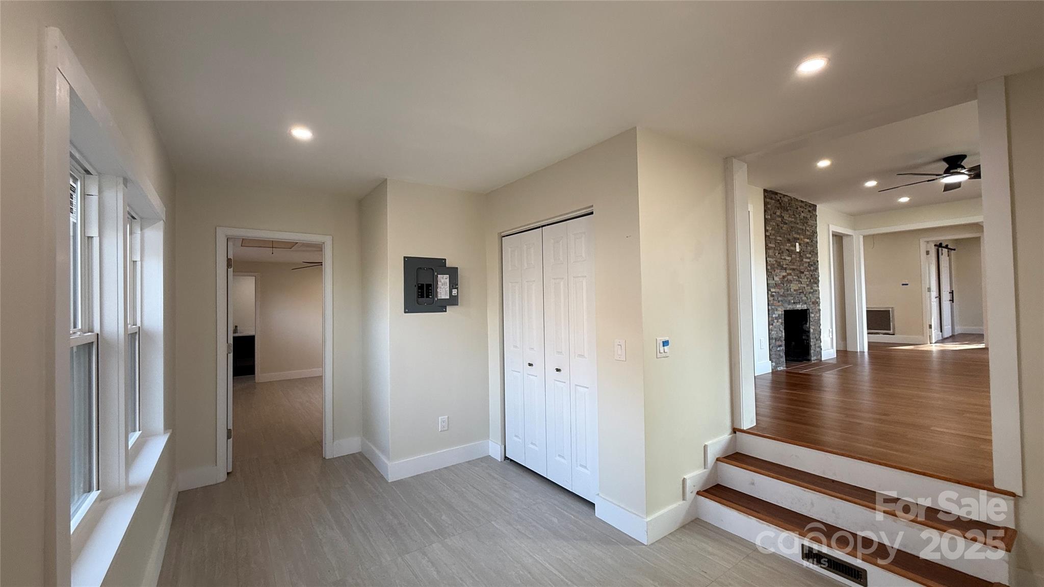 809 Howard Street Shelby, NC 28152 - Photo 32 of 41 a view of a hallway with wooden floor and a cabinet