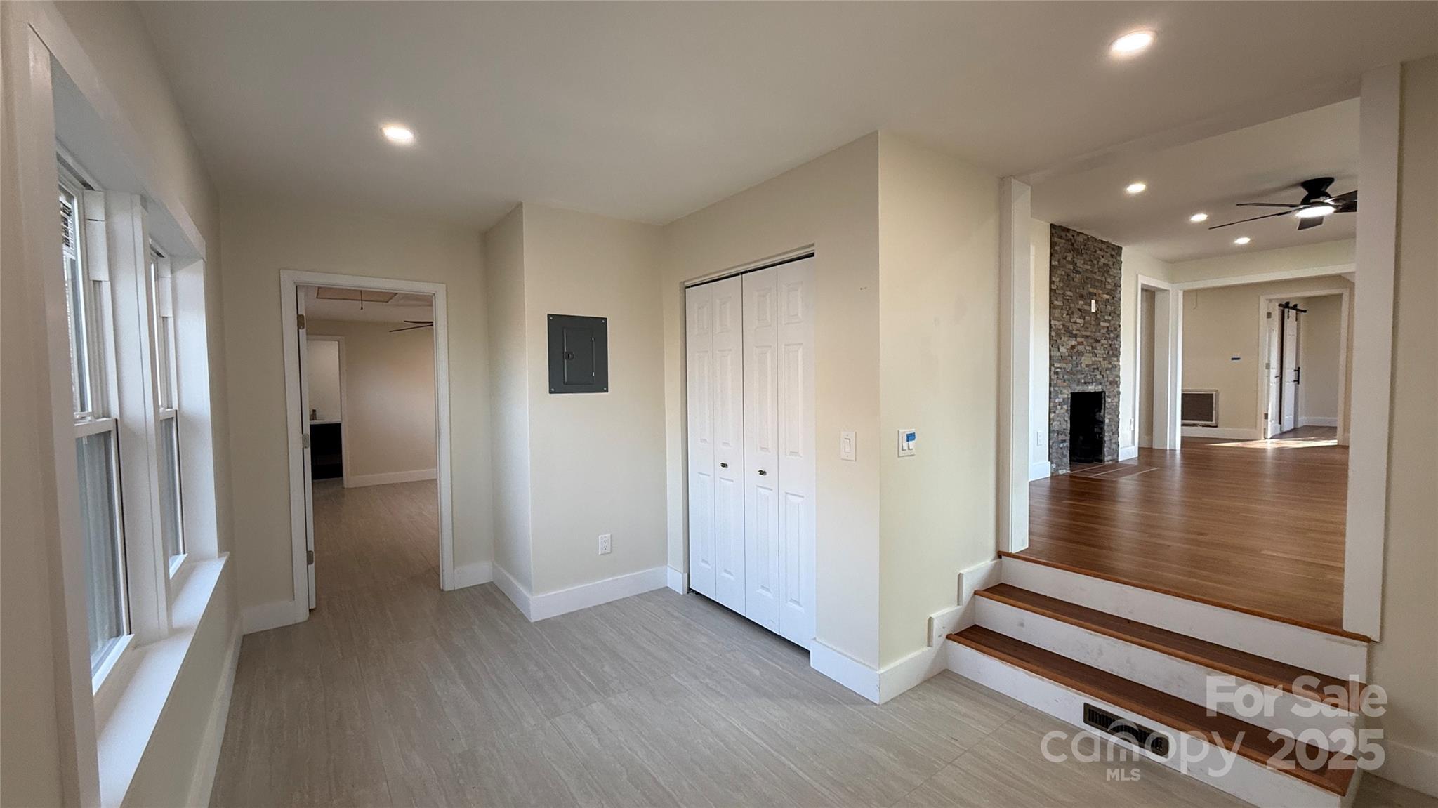 809 Howard Street Shelby, NC 28152 - Photo 33 of 41 a view of a hallway with wooden floor and closet area