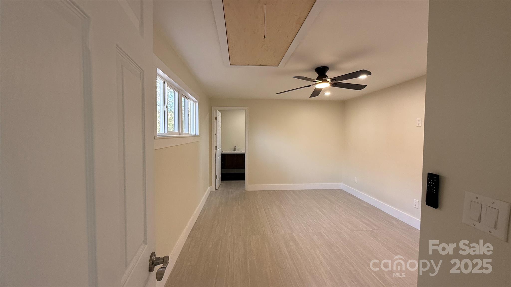 809 Howard Street Shelby, NC 28152 - Photo 34 of 41 wooden floor in an empty room with a window