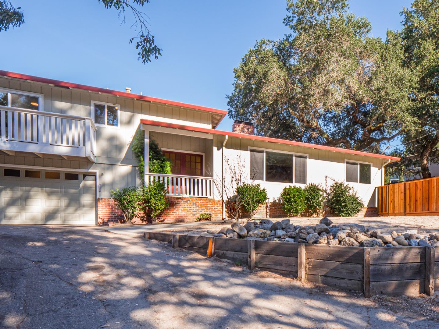 8460 Hihn Road Ben Lomond, CA 95005 - Photo 1 of 50 a view of a house with backyard and sitting area