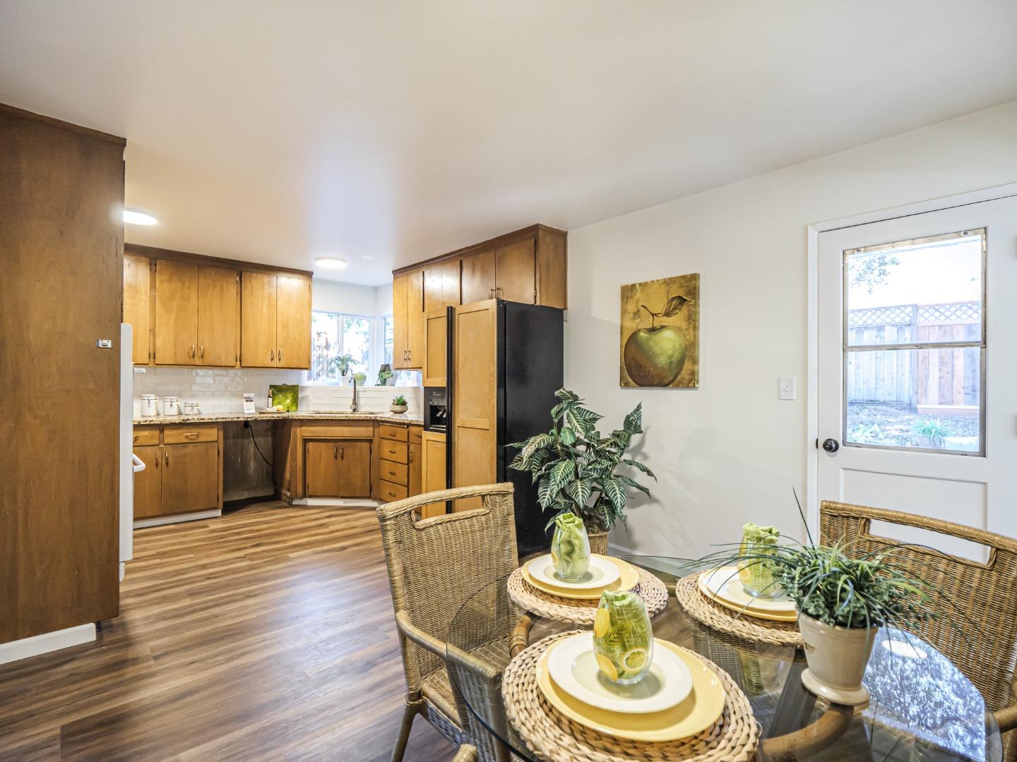 8460 Hihn Road Ben Lomond, CA 95005 - Photo 12 of 50 a kitchen with a table and chairs in it