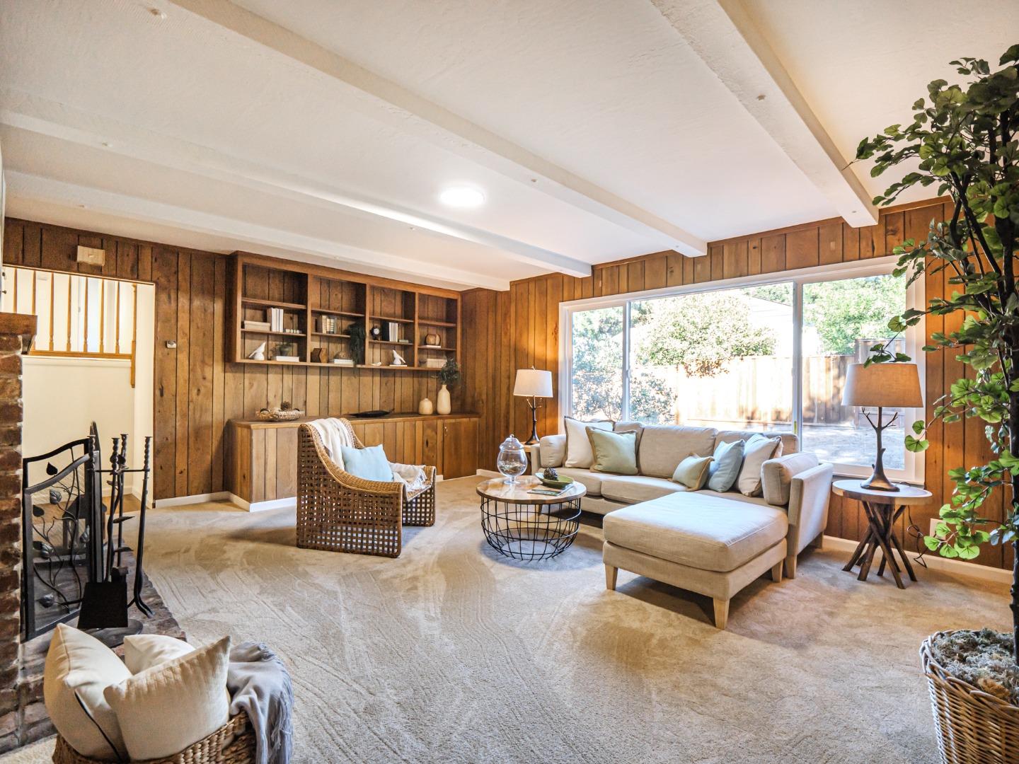 8460 Hihn Road Ben Lomond, CA 95005 - Photo 16 of 50 a living room with furniture and a large window