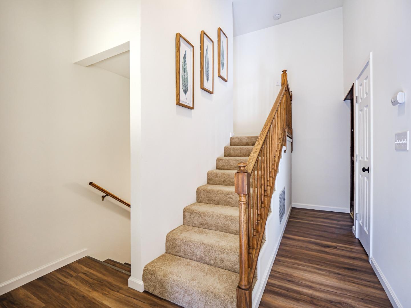 8460 Hihn Road Ben Lomond, CA 95005 - Photo 20 of 50 a view of staircase with wooden floor and white walls