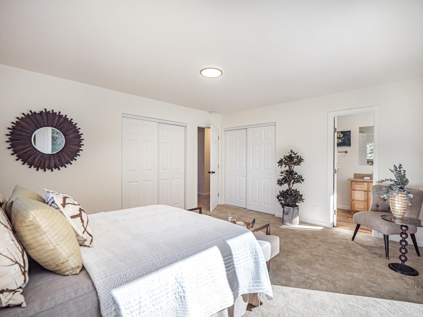 8460 Hihn Road Ben Lomond, CA 95005 - Photo 23 of 50 a bedroom with a bed and cabinets