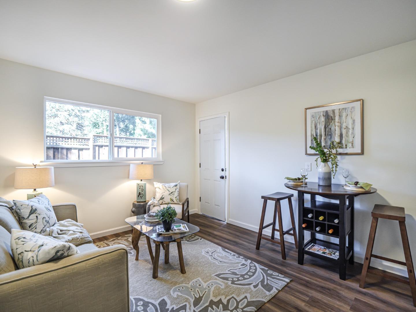 8460 Hihn Road Ben Lomond, CA 95005 - Photo 36 of 50 a living room with furniture and a window