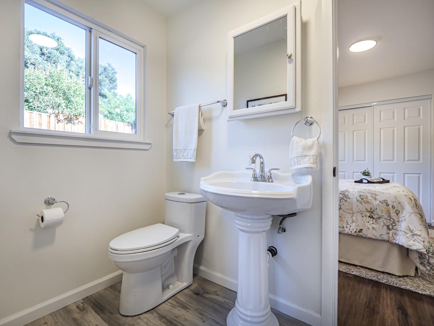 8460 Hihn Road Ben Lomond, CA 95005 - Photo 39 of 50 a bathroom with a sink toilet and mirror