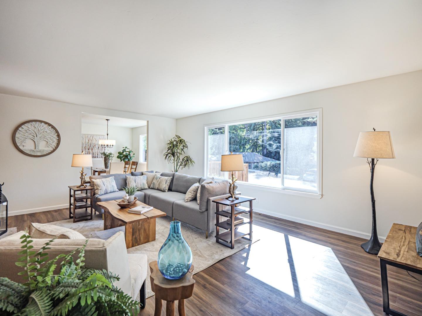 8460 Hihn Road Ben Lomond, CA 95005 - Photo 4 of 50 a living room with furniture a window and a table